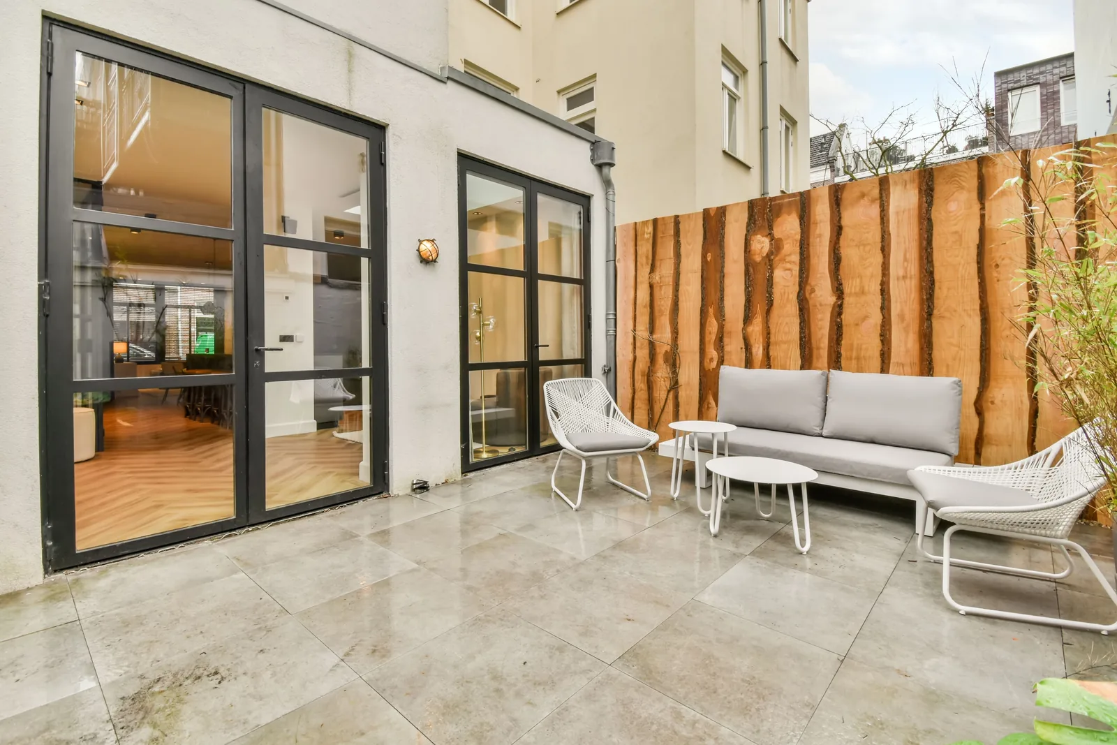 Pair of black French doors with full glass